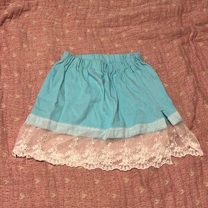 Never worn super cute skirt. Stretchy waist